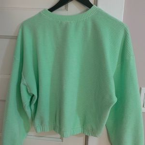 Neon green divided fuzzy crop top